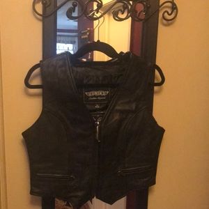 Unik Black leather biker vest.